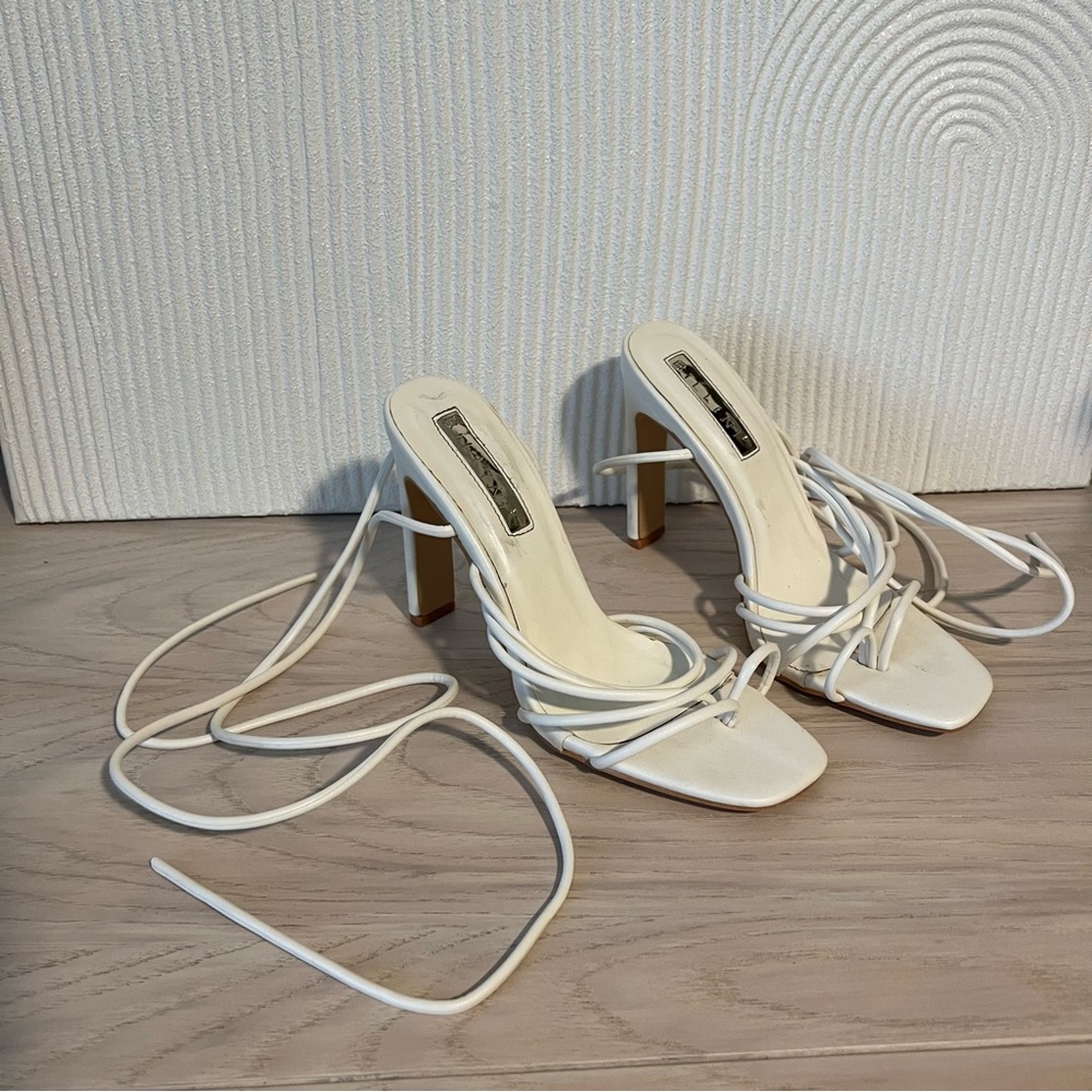 White strappy heels tie up